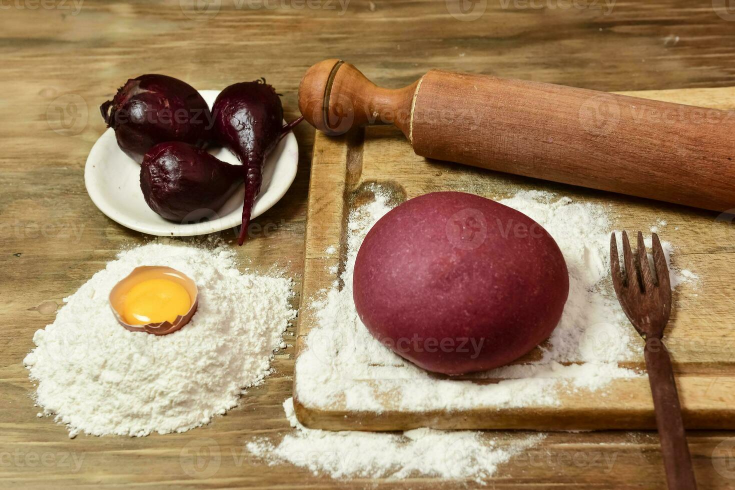 Purple dough bun for noodles with ingredients on the table. photo