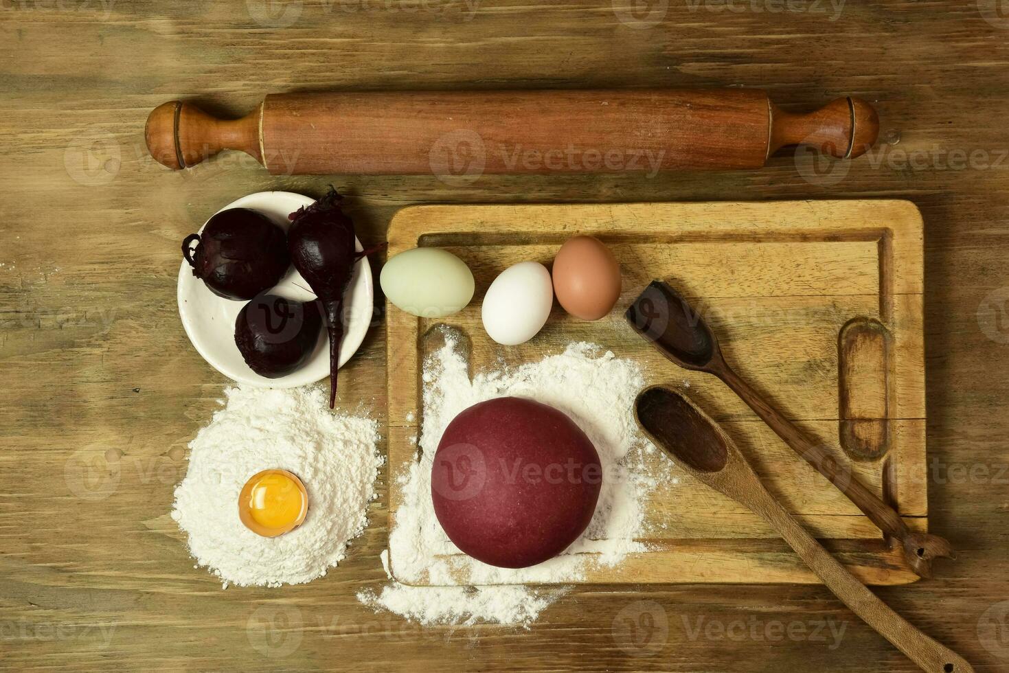 Purple dough bun for noodles with ingredients on the table. photo