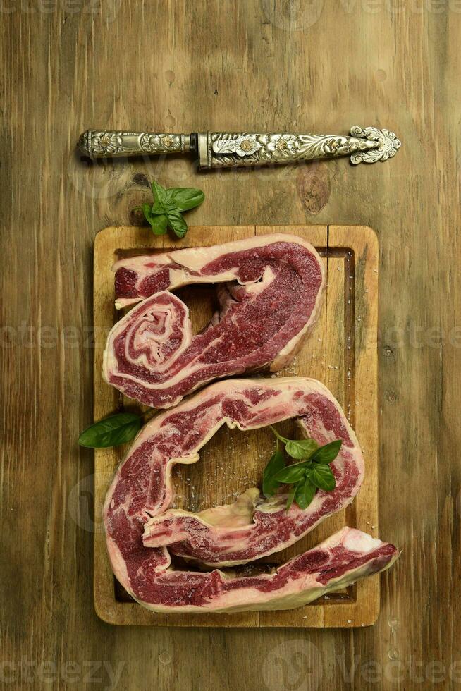 Veal ribs presented on the table, Patagonia, Argentina. photo