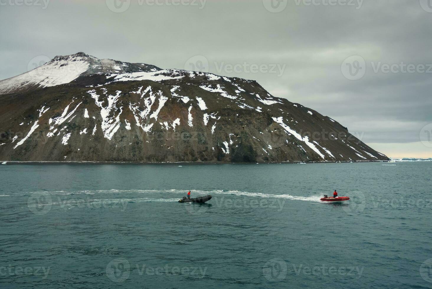 Expedition ship, cruise in Antarctic landscape, Paulet island, near the Antarctic Peninsula photo