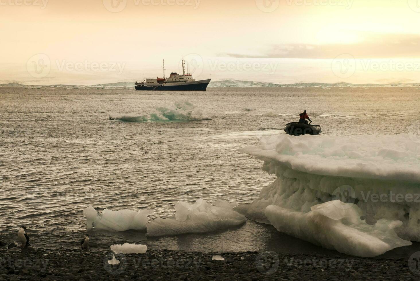 Expedition ship, cruise in Antarctic landscape, Paulet island, near the Antarctic Peninsula photo