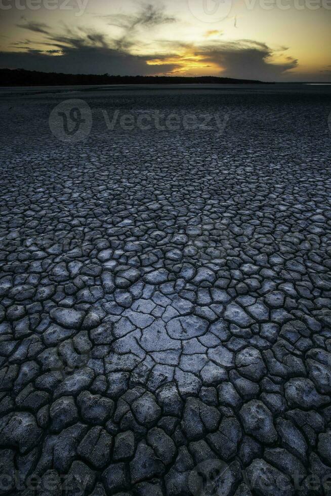 Broken dry soil in a Pampas lagoon, La Pampa province, Patagonia, Argentina. photo