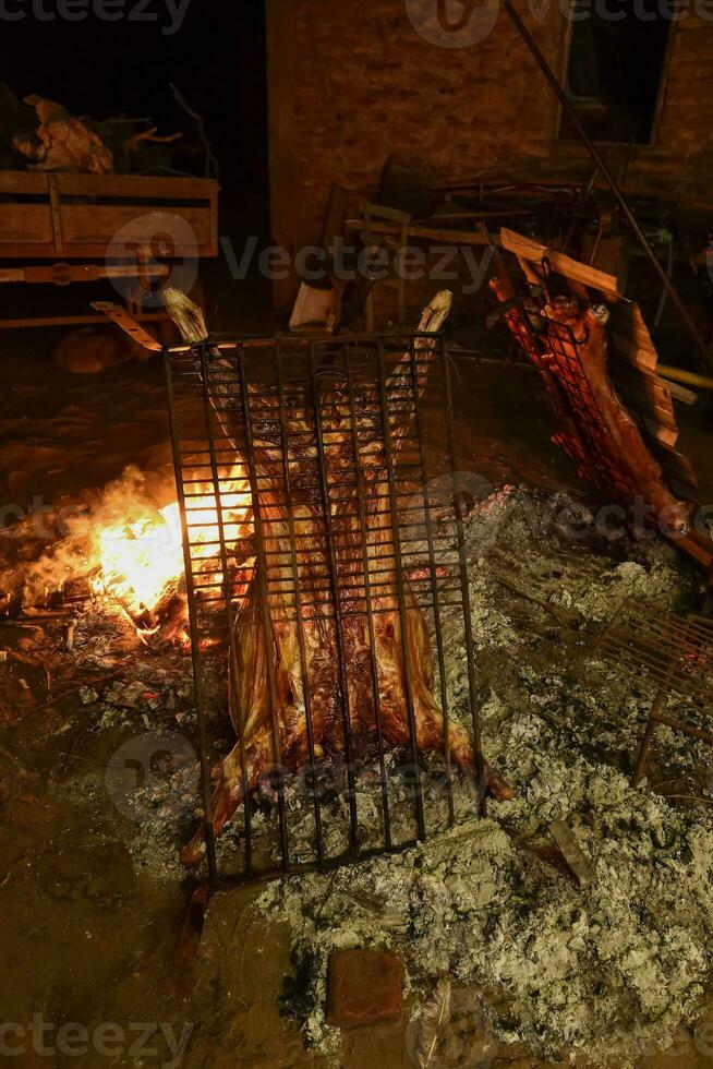 Lamb on the spit, roast lamb, Patagonia photo