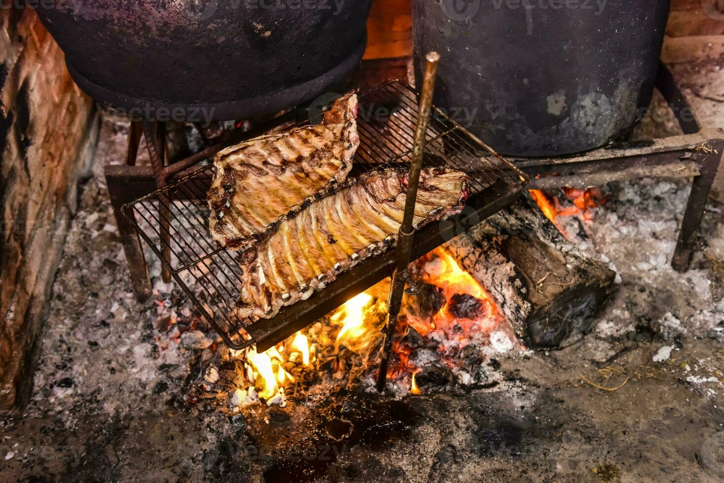 Pig ribbs barbecue , Patagonia, Argentina photo