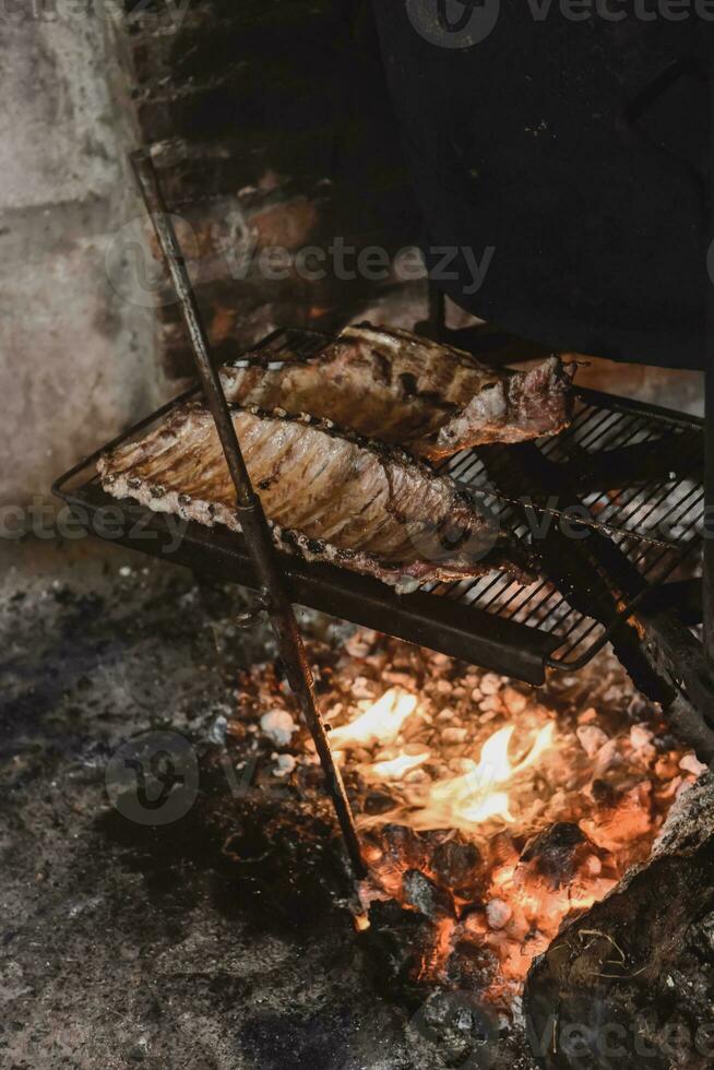 cerdo costillas parilla , Patagonia, argentina foto