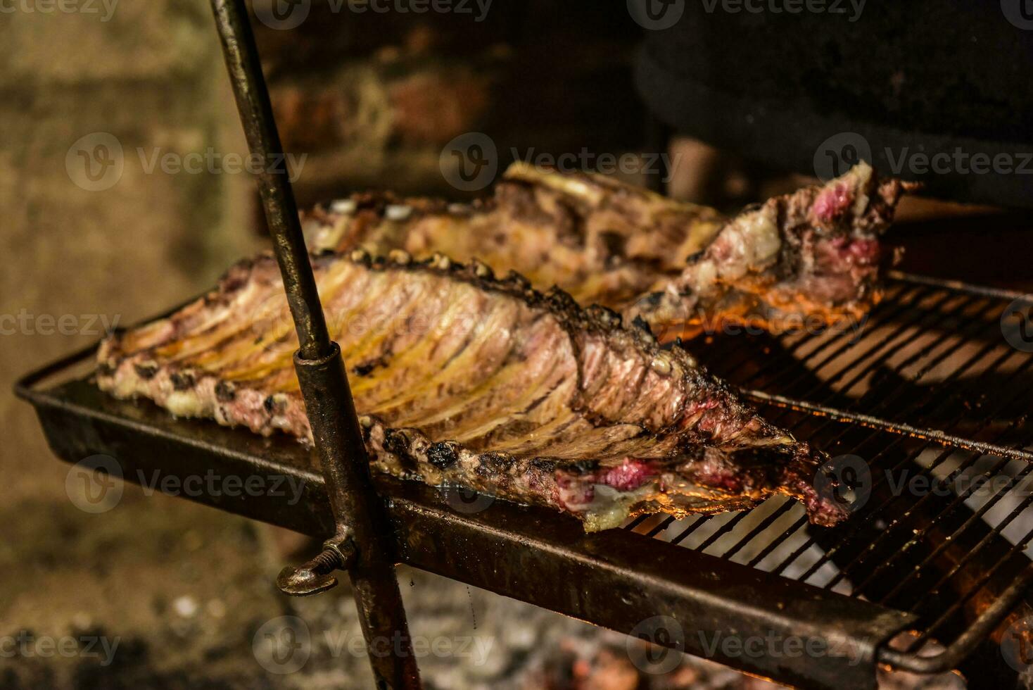 Pig ribbs barbecue , Patagonia, Argentina photo