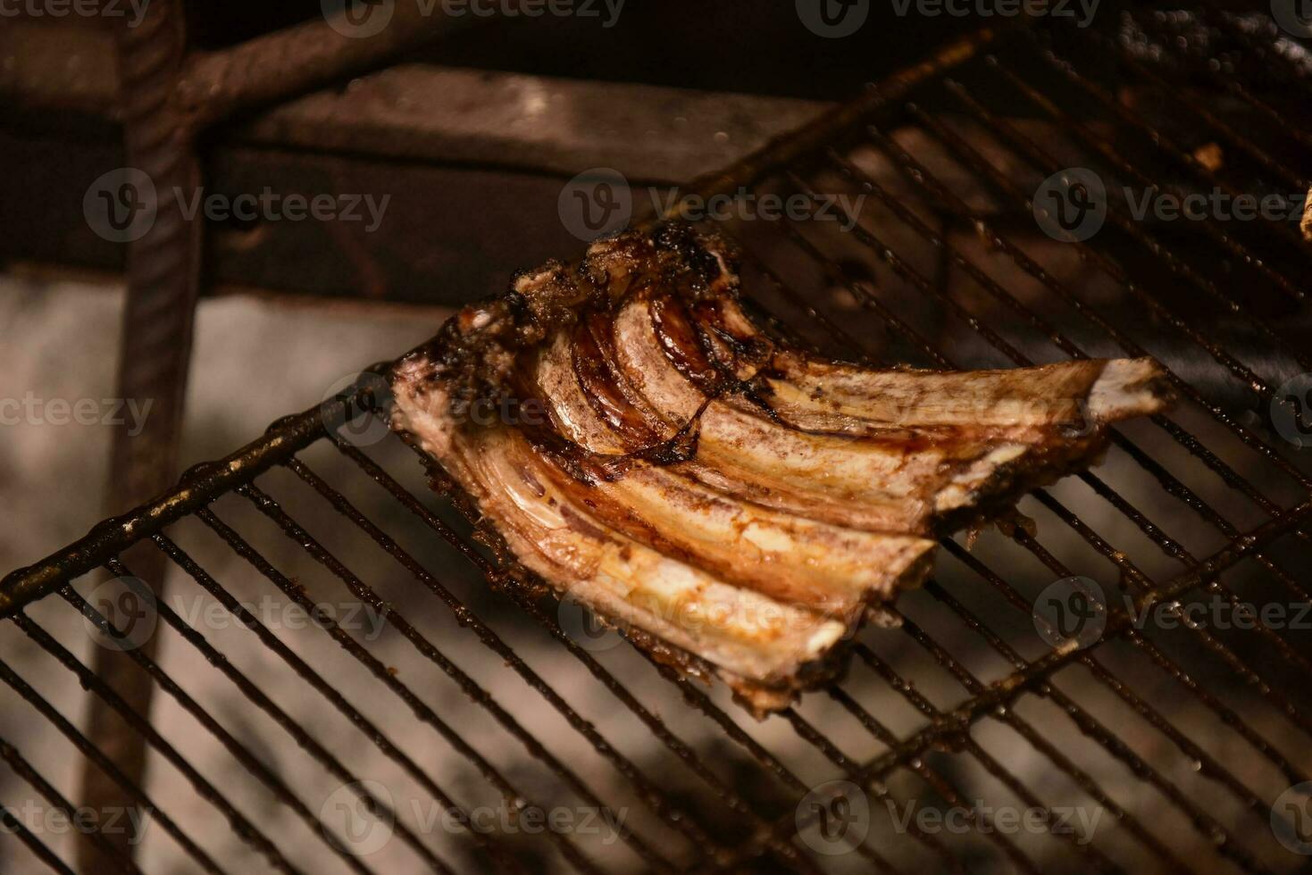 Pig ribbs barbecue , Patagonia, Argentina photo