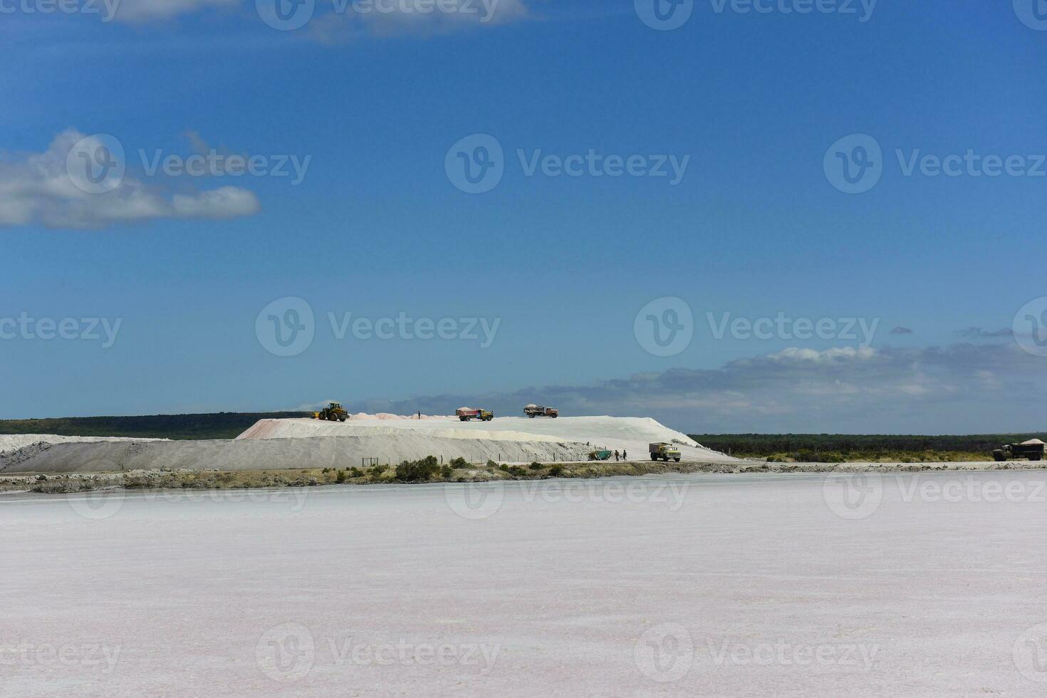 Extraction of raw material salt, from an open pit mine, La Pampa, Argentina photo