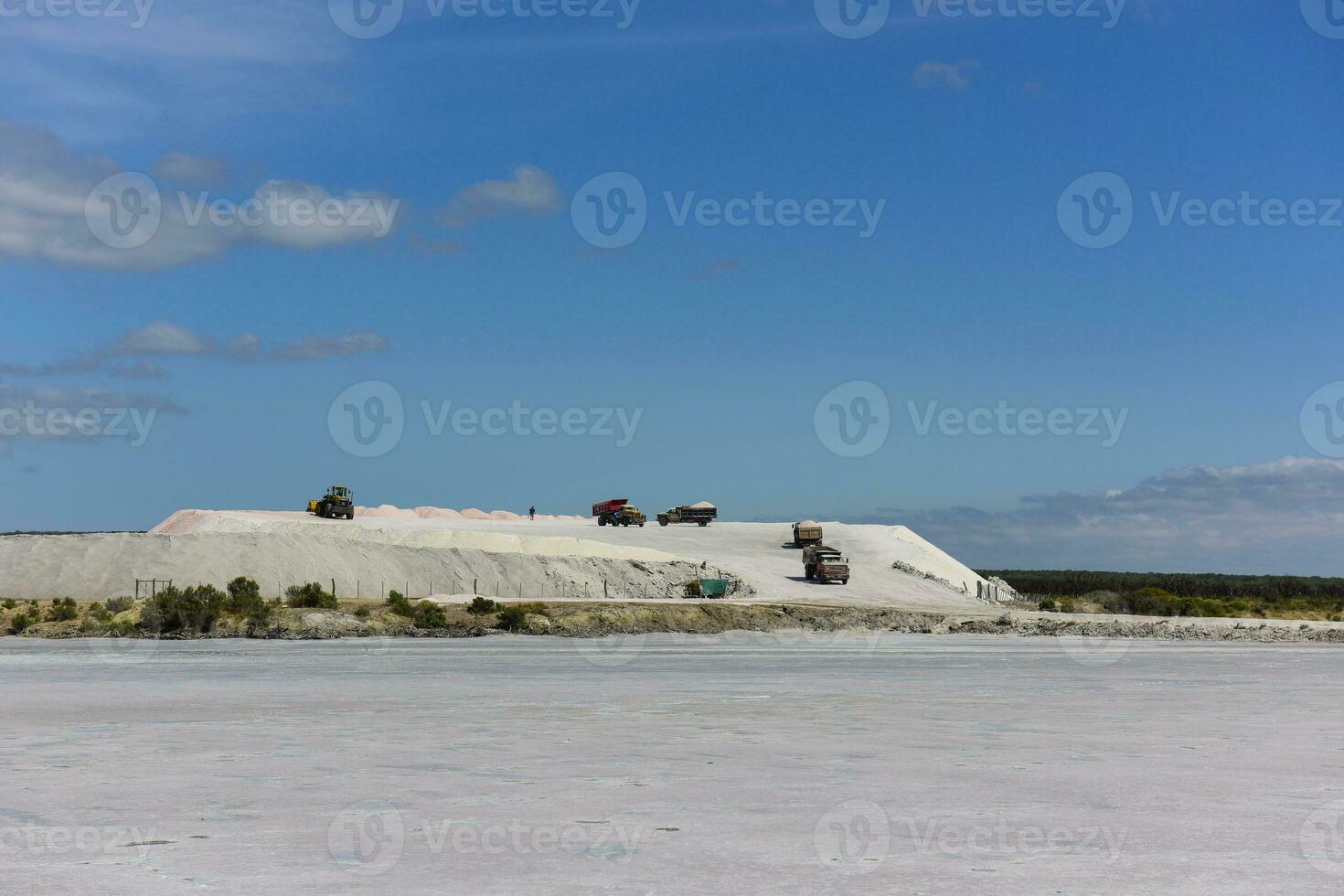 Extraction of raw material salt, from an open pit mine, La Pampa, Argentina photo