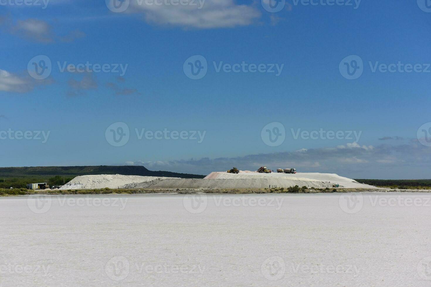 Extraction of raw material salt, from an open pit mine, La Pampa, Argentina photo