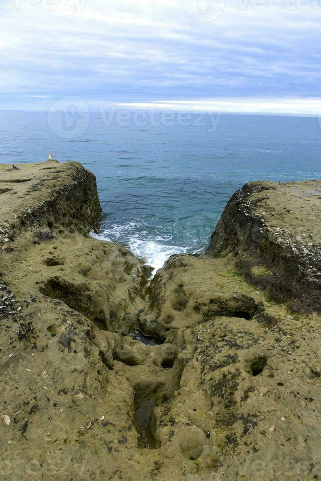 Coastal landscape with cliffs in Peninsula Valdes, World Heritage Site, Patagonia Argentina photo