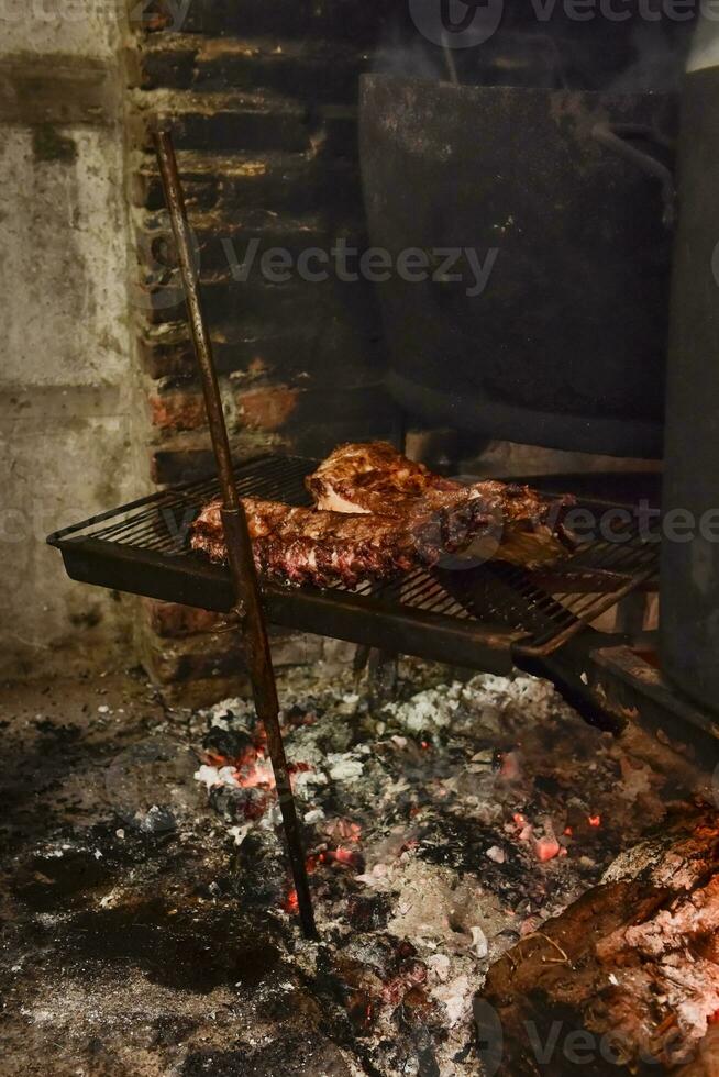 Pig ribbs barbecue , Patagonia, Argentina photo