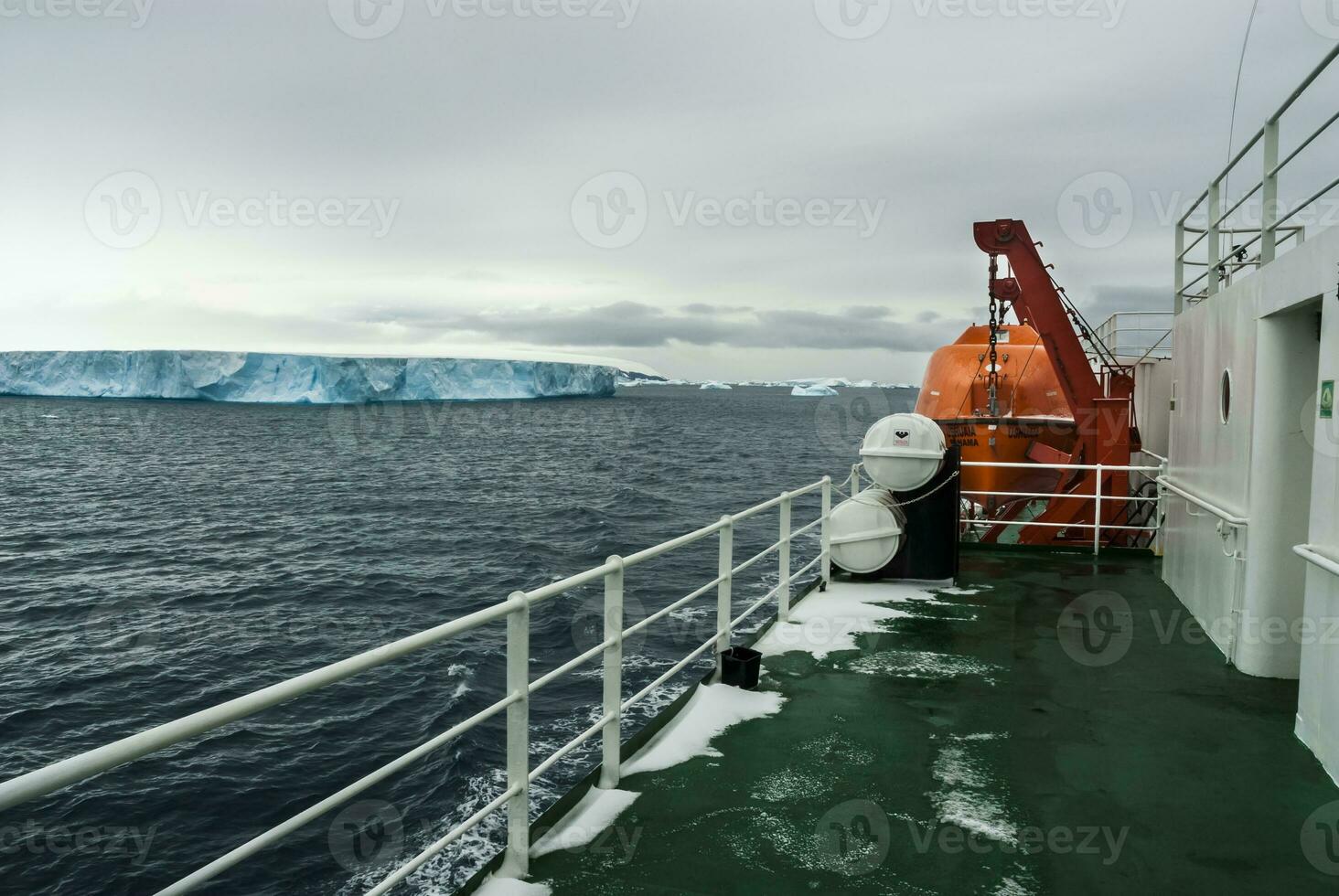 Expedition ship, cruise in Antarctic landscape, Paulet island, near the Antarctic Peninsula photo