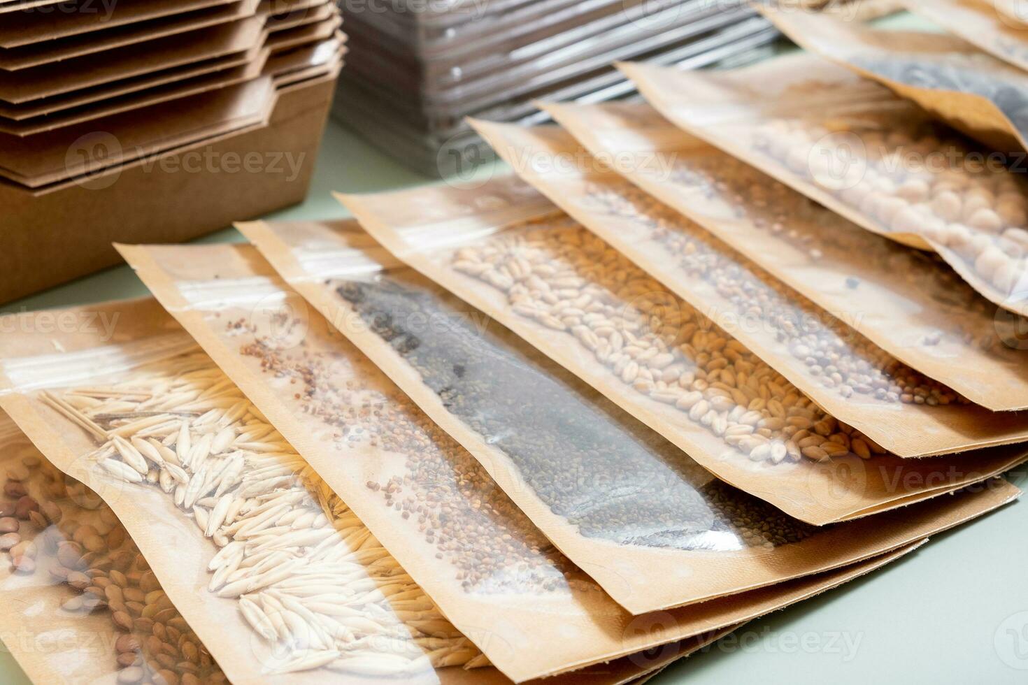 Lentil seeds and bags with other contents for germinating microgreens photo