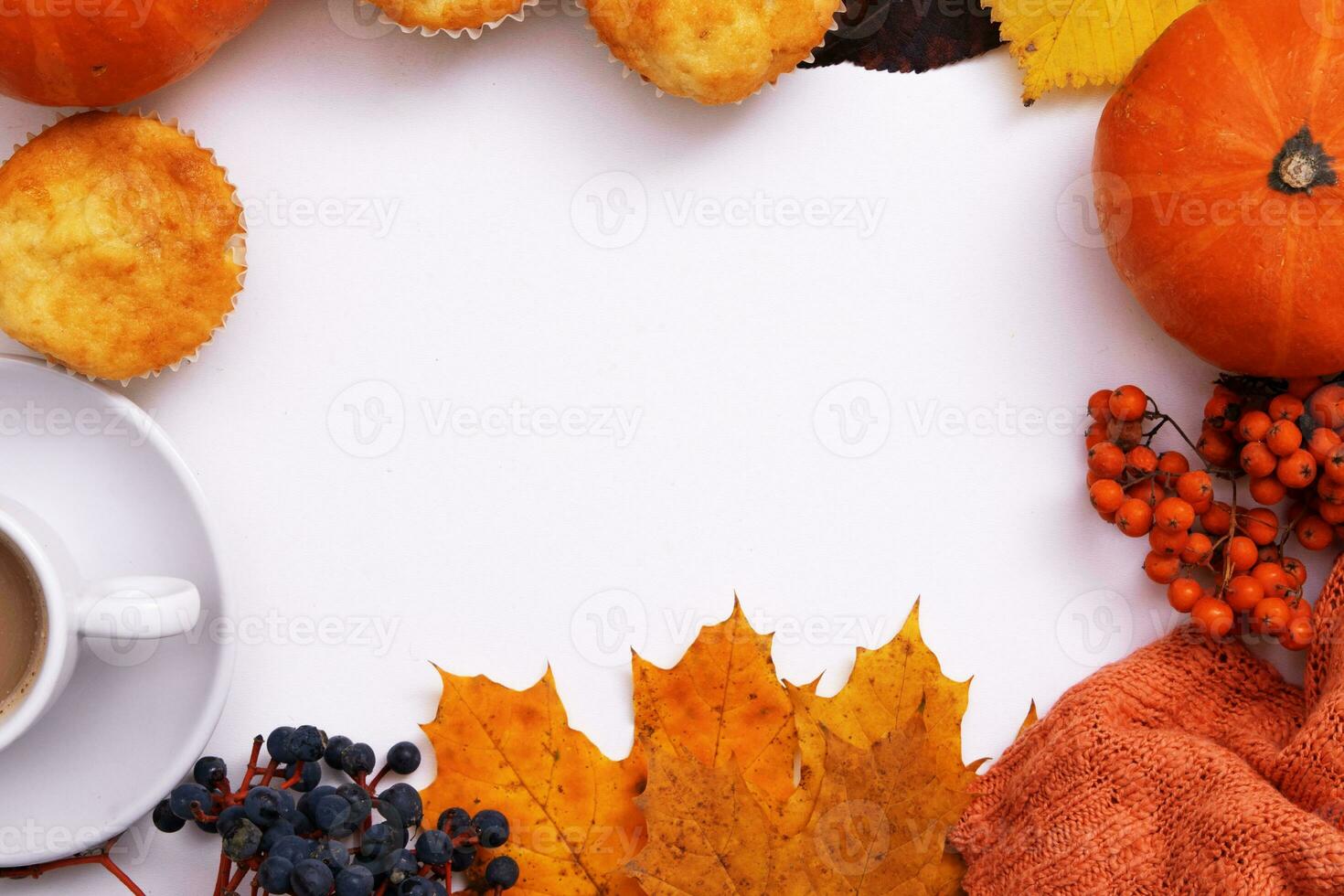 Cozy autumn flat lay with coffee, pumkin, sweater and copy space photo