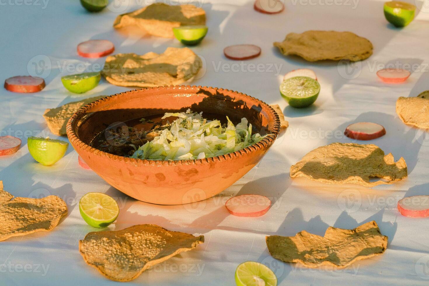 In Mexico, the vibrant red pozole is a delicious traditional comfort food photo