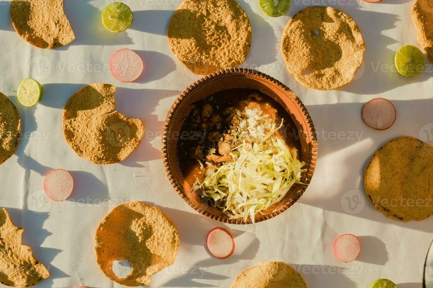 In Mexico, the vibrant red pozole is a delicious traditional comfort food photo