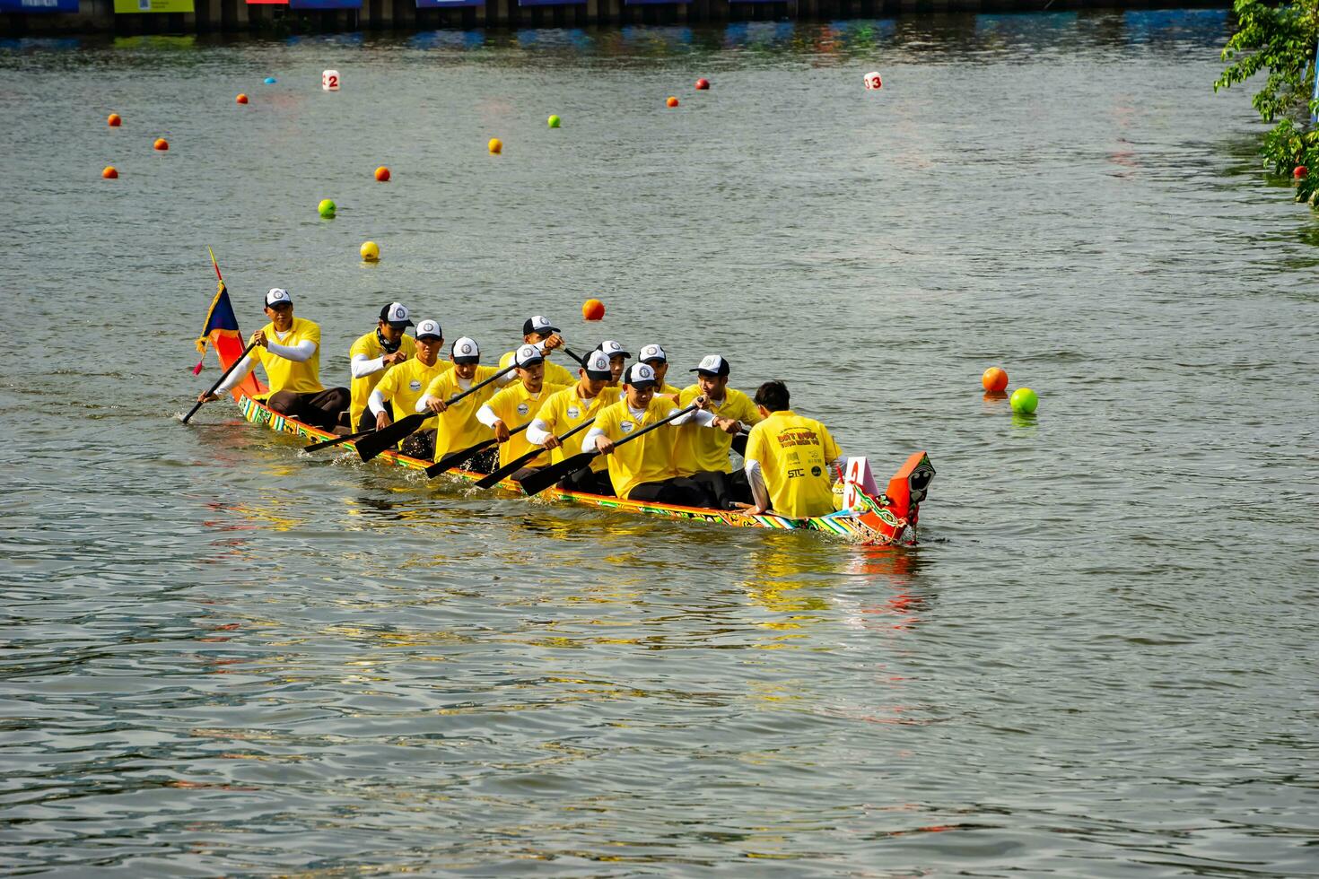 Ho Chi Minh, Viet Nam - 23 April 2023 Blurry motion of boat racing in the traditional Ngo boat racing festival of Khmer people photo