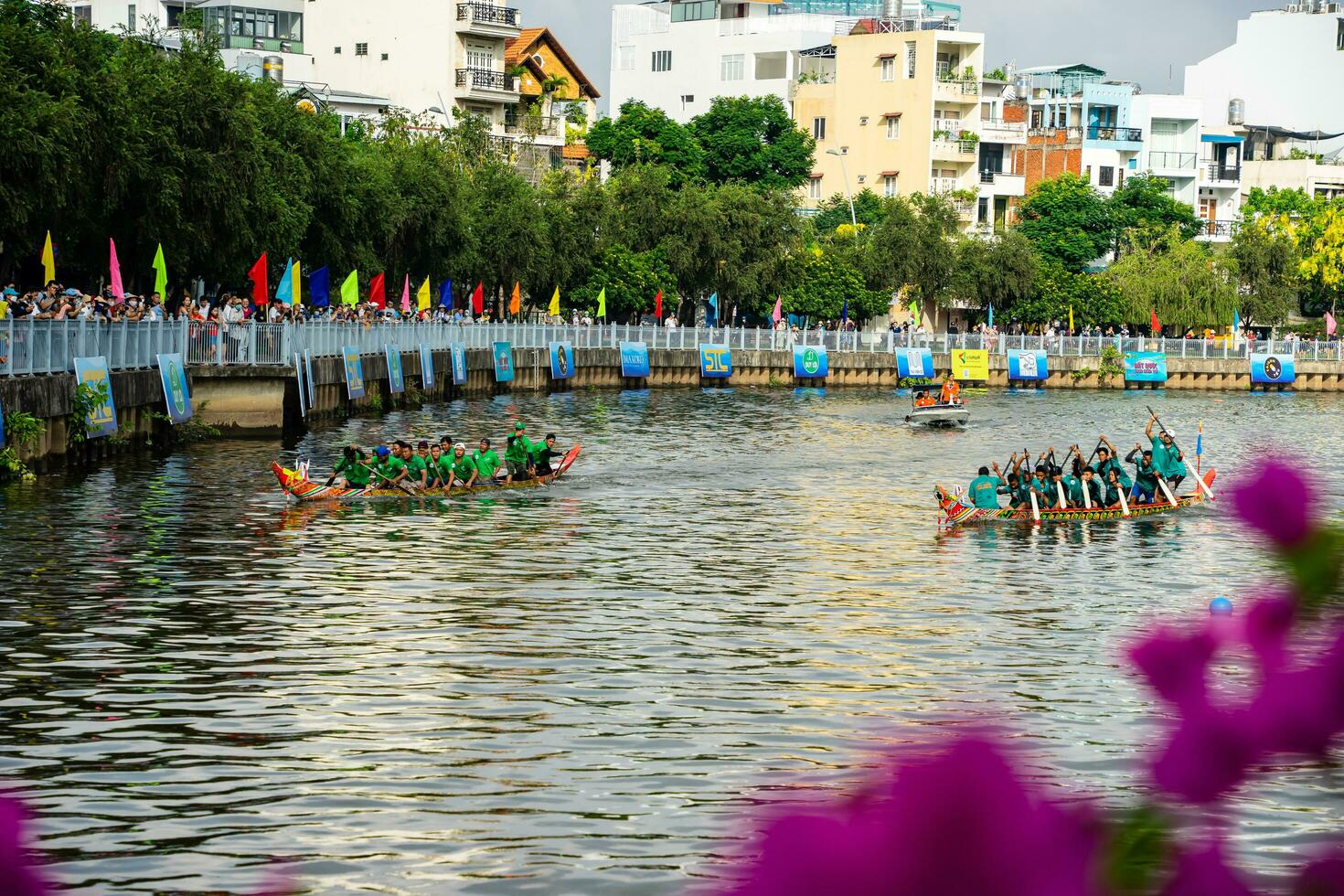 Ho Chi Minh, Viet Nam - 23 April 2023 Blurry motion of boat racing in the traditional Ngo boat racing festival of Khmer people photo