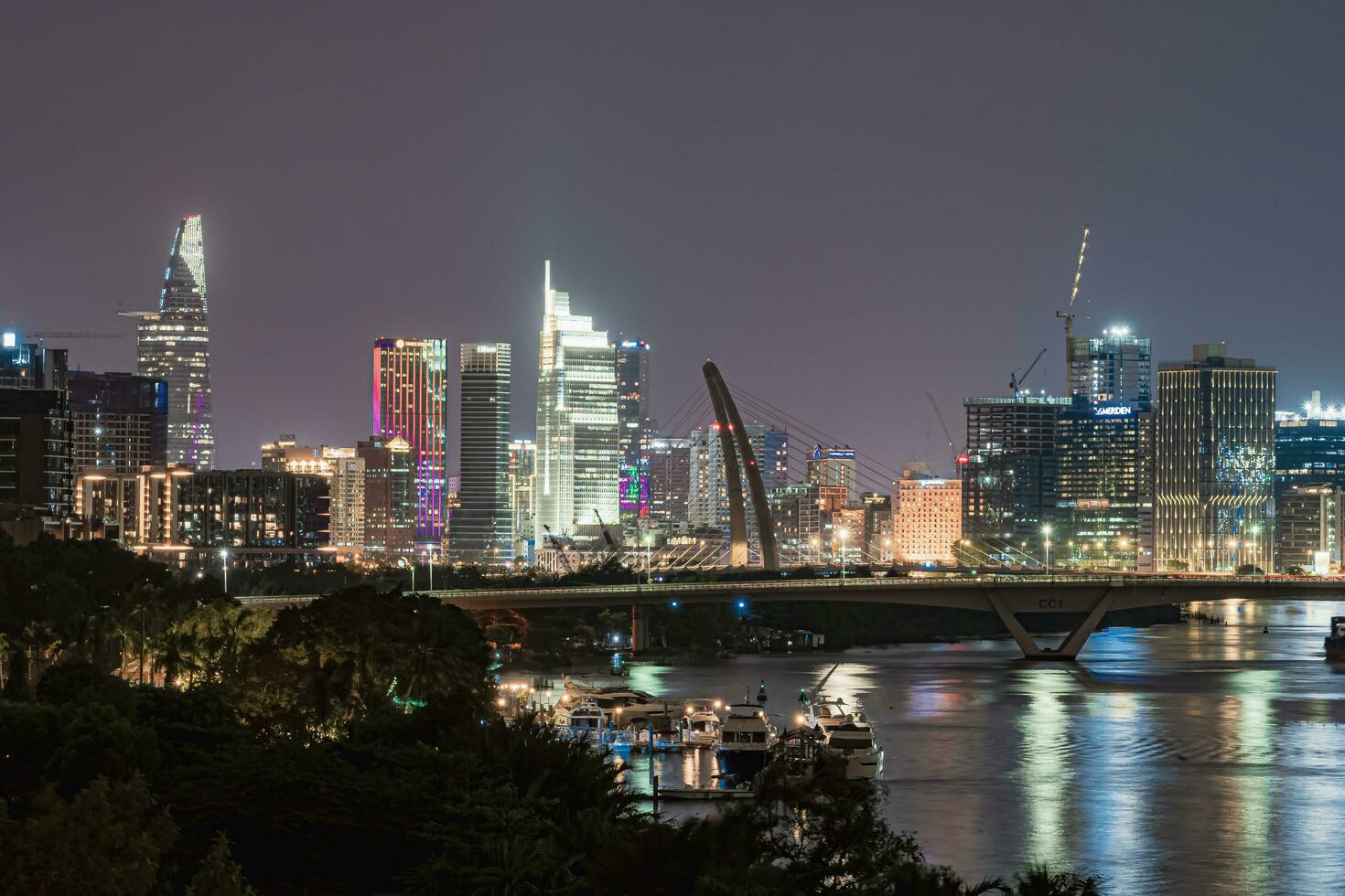 Ho Chi Minh, Viet Nam - 28 April 2023 night view to disttrict 1 of Ho Chi Minh city photo