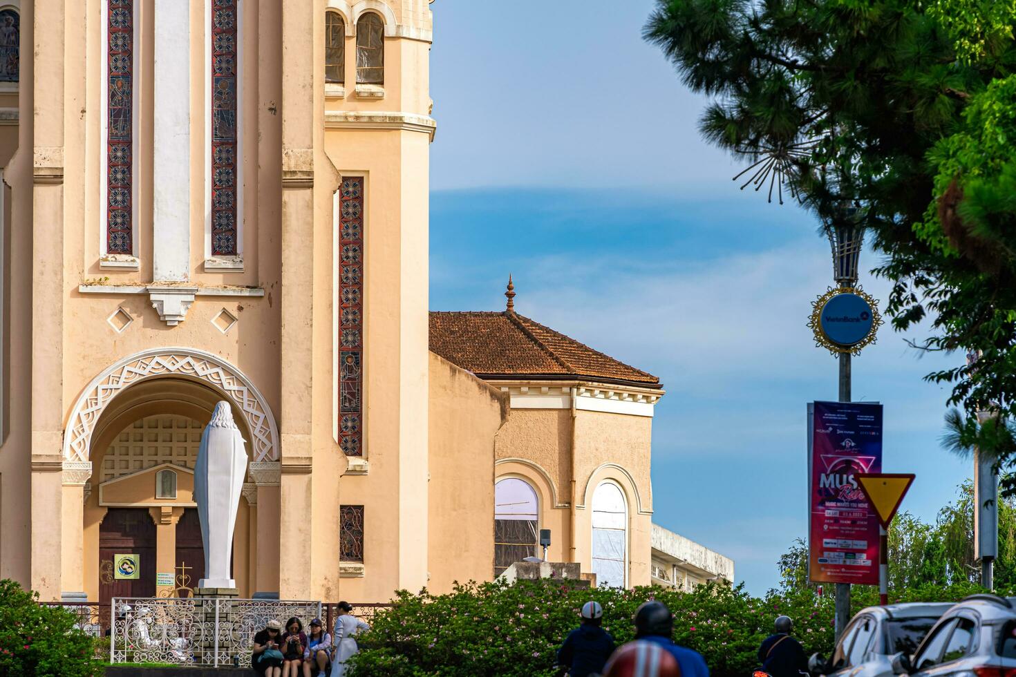 Da Lat, Viet Nam - 3 June 2023 Looking towards Da Lat Cathedral, Chicken Church on a green road photo