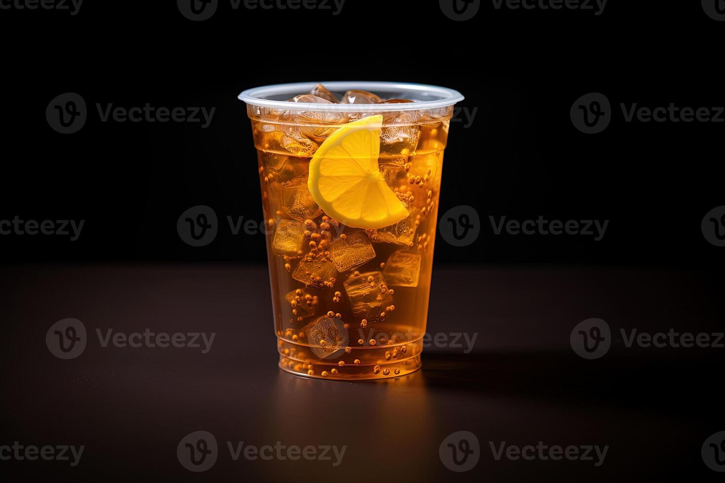 Iced lemon tea on plastic takeaway glass isolated on dark background. ai generated photo