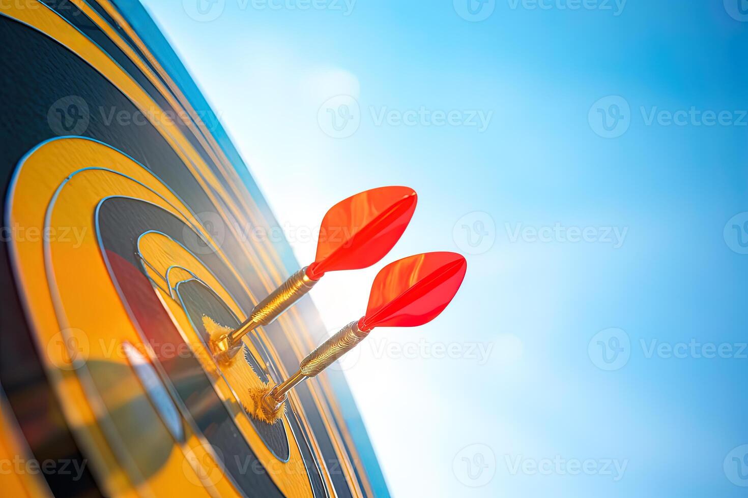 red darts arrows in the target center on blue sky background. Business target and success concept. photo