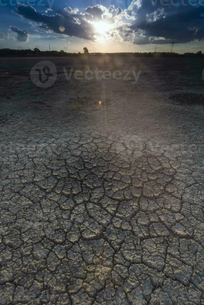 Broken dry soil in a Pampas lagoon, La Pampa province, Patagonia, Argentina. photo