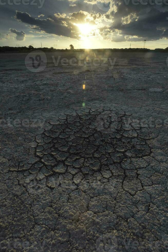 Broken dry soil in a Pampas lagoon, La Pampa province, Patagonia, Argentina. photo