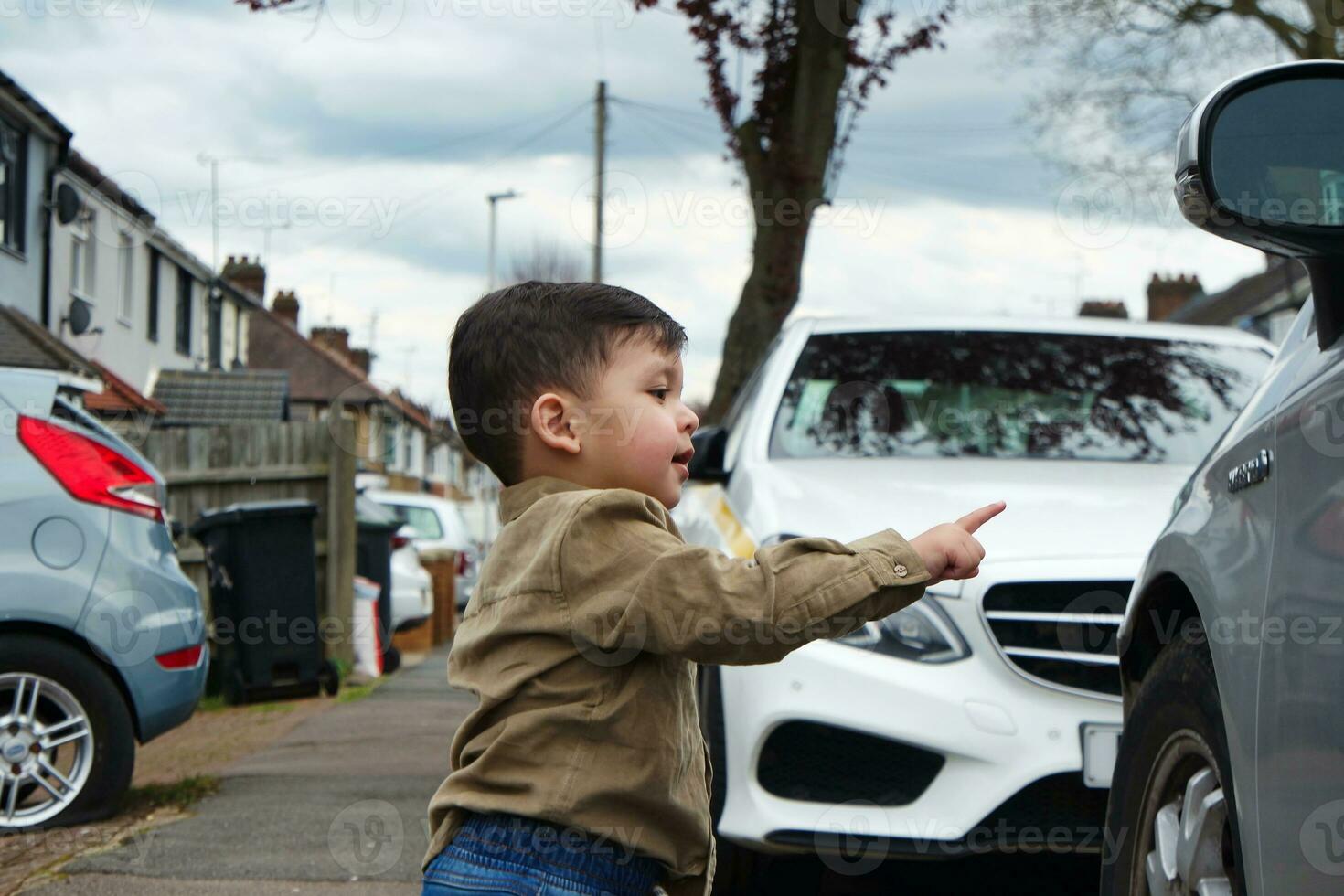 Beautiful Close up Portrait of an Asian Pakistani Baby Boy Named Ahmed Mustafain Haider is Posing at Home Garden at Saint Augustine Ave Luton, England UK. Image Was Captured on April 03rd, 2023. photo