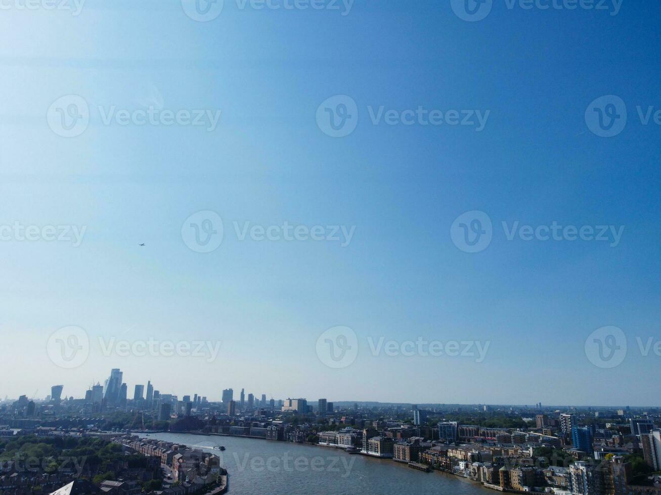 High Angle View of Canary Wharf Buildings at Central London City of England Great Britain. The Footage Was Captured on June 08th, 2023 During Clear Day. photo