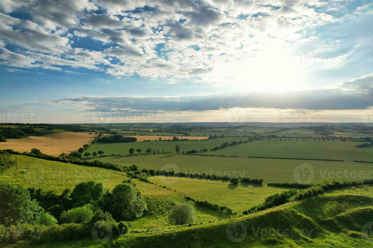 Beautiful Aerial View of  British Landscape and Sky with Clouds at Sharpenhoe Clappers Near Luton, England UK. Image Was Captured with drones Camera on June 24th, 2023 photo