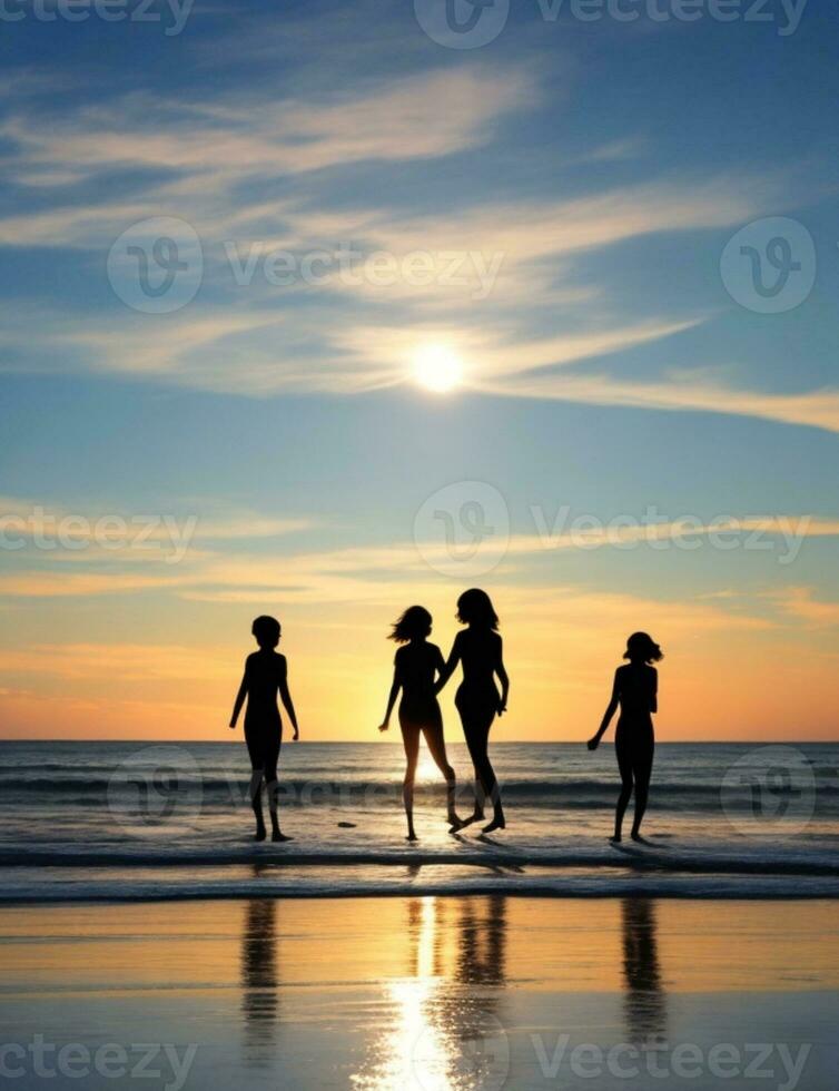 Silhouettes of friends enjoying beach activities together photo