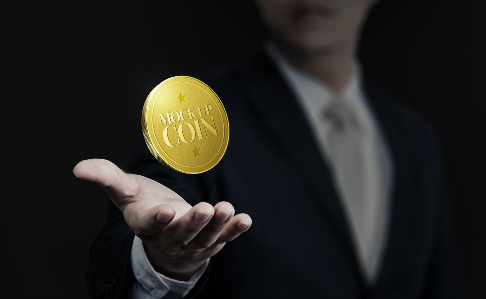 Business man holding golden coin mockup psd