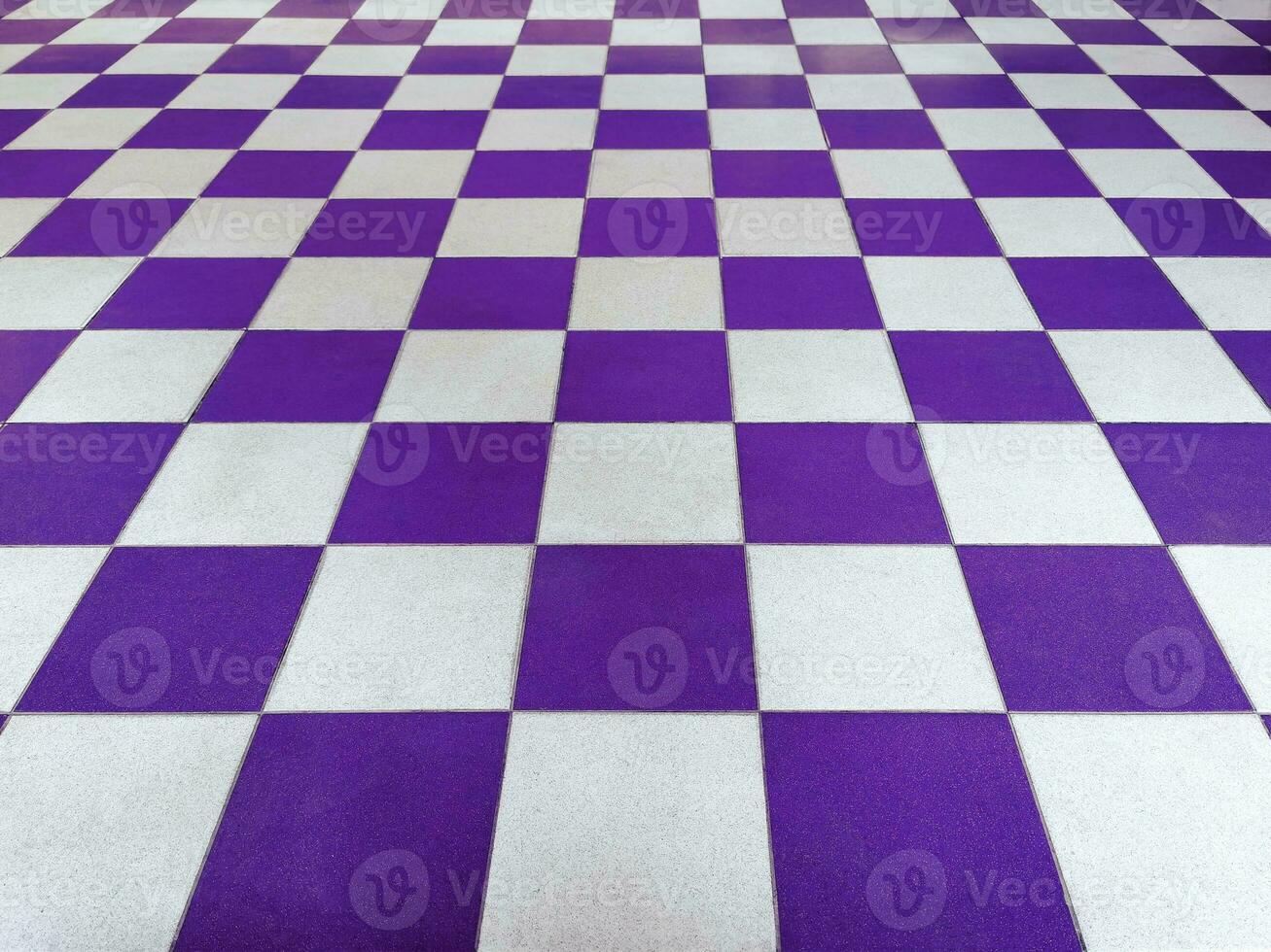 Purple and white tiled floor symmetrical with a grid texture in perspective perspective for a permanent tiled floor background. red white square Made of ceramic material for flooring photo