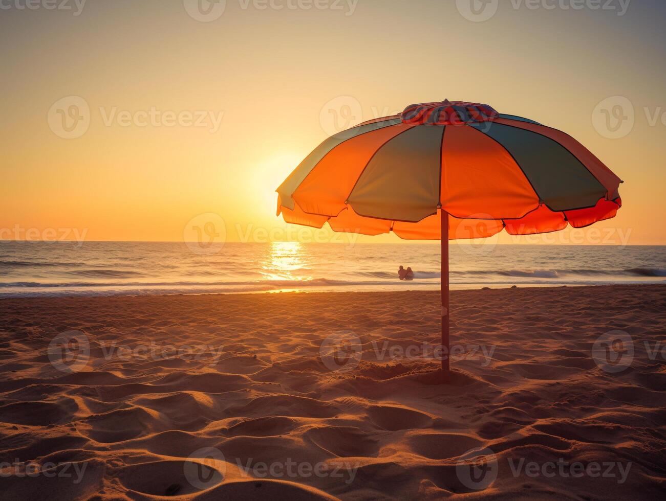 A Bird's-Eye View of Tranquility - A Serene Beach Umbrella During the Golden Hour - photo