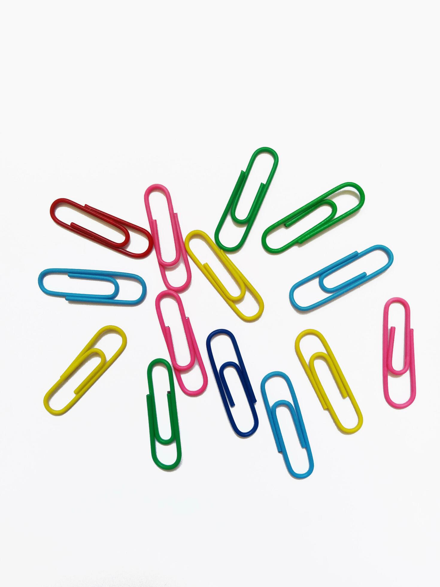 multicolored paper clips on a white background 26270101 Stock Photo at