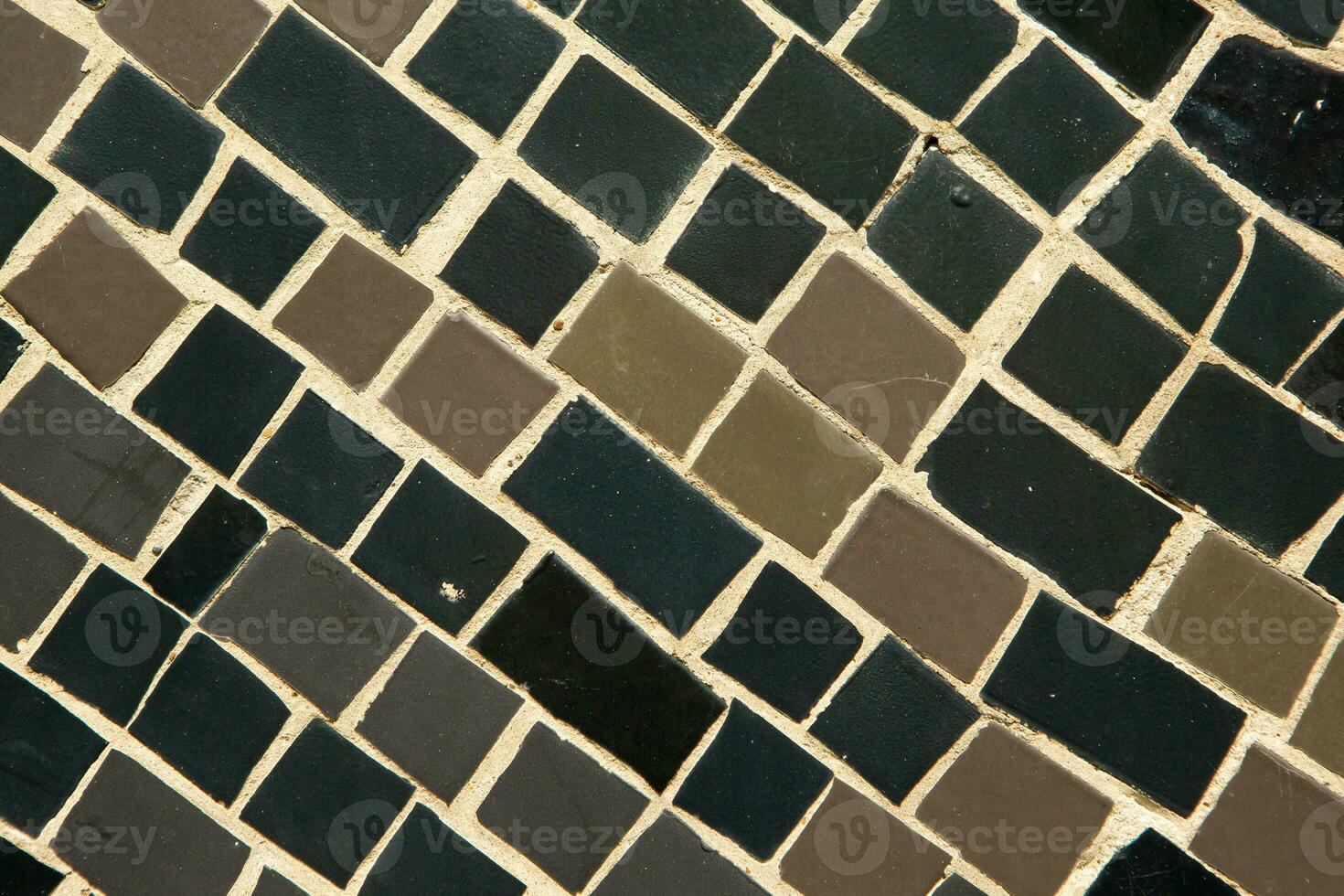Colorful ceramic mosaic on the walls of the building. Abstract background and texture for design. photo