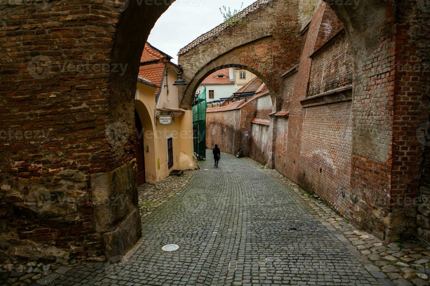 Medieval street with historical buildings in the heart of Romania. Sibiu the eastern European citadel city. Travel in Europe photo