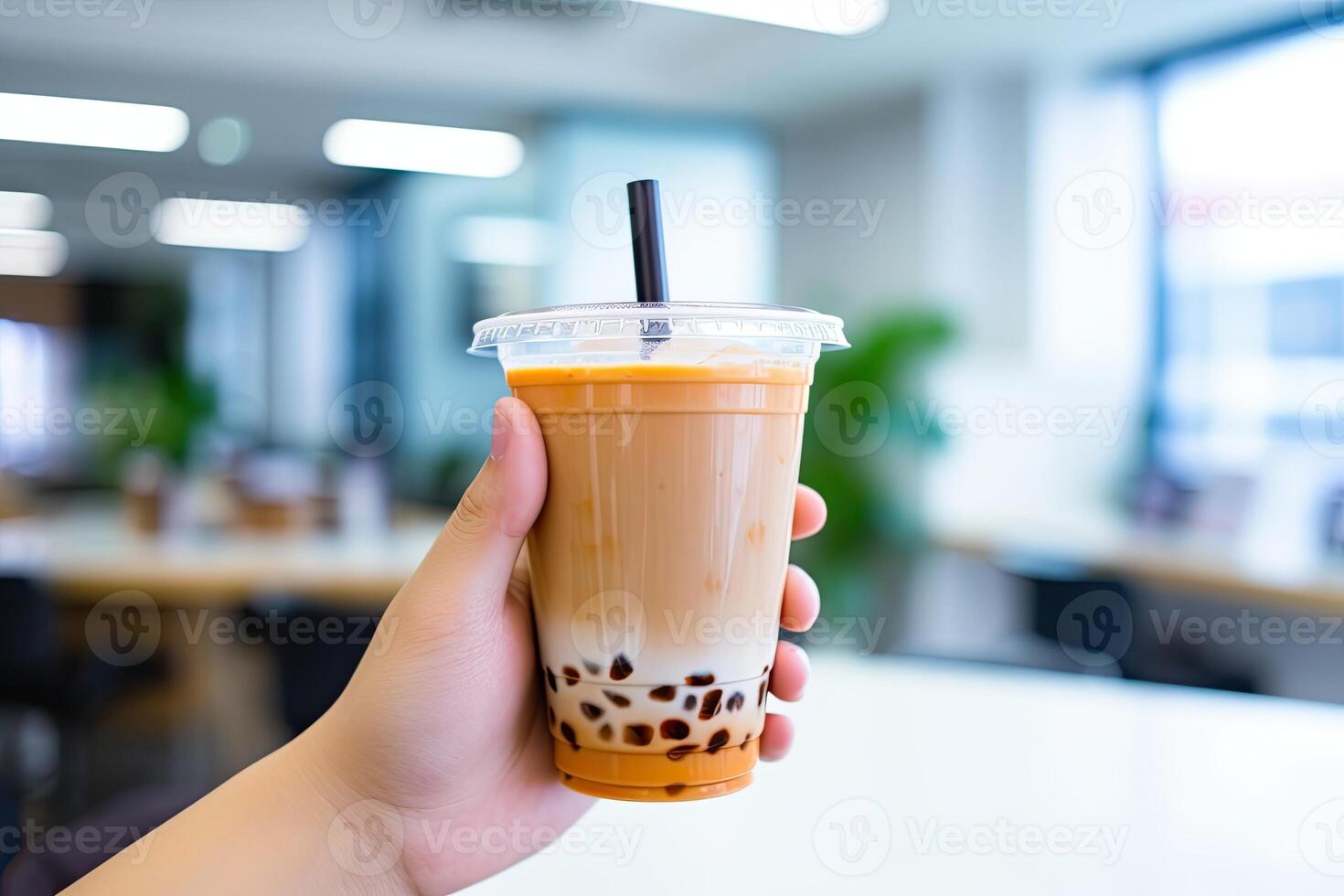illustration of hand holding Taiwan milk tea and blurry background photo