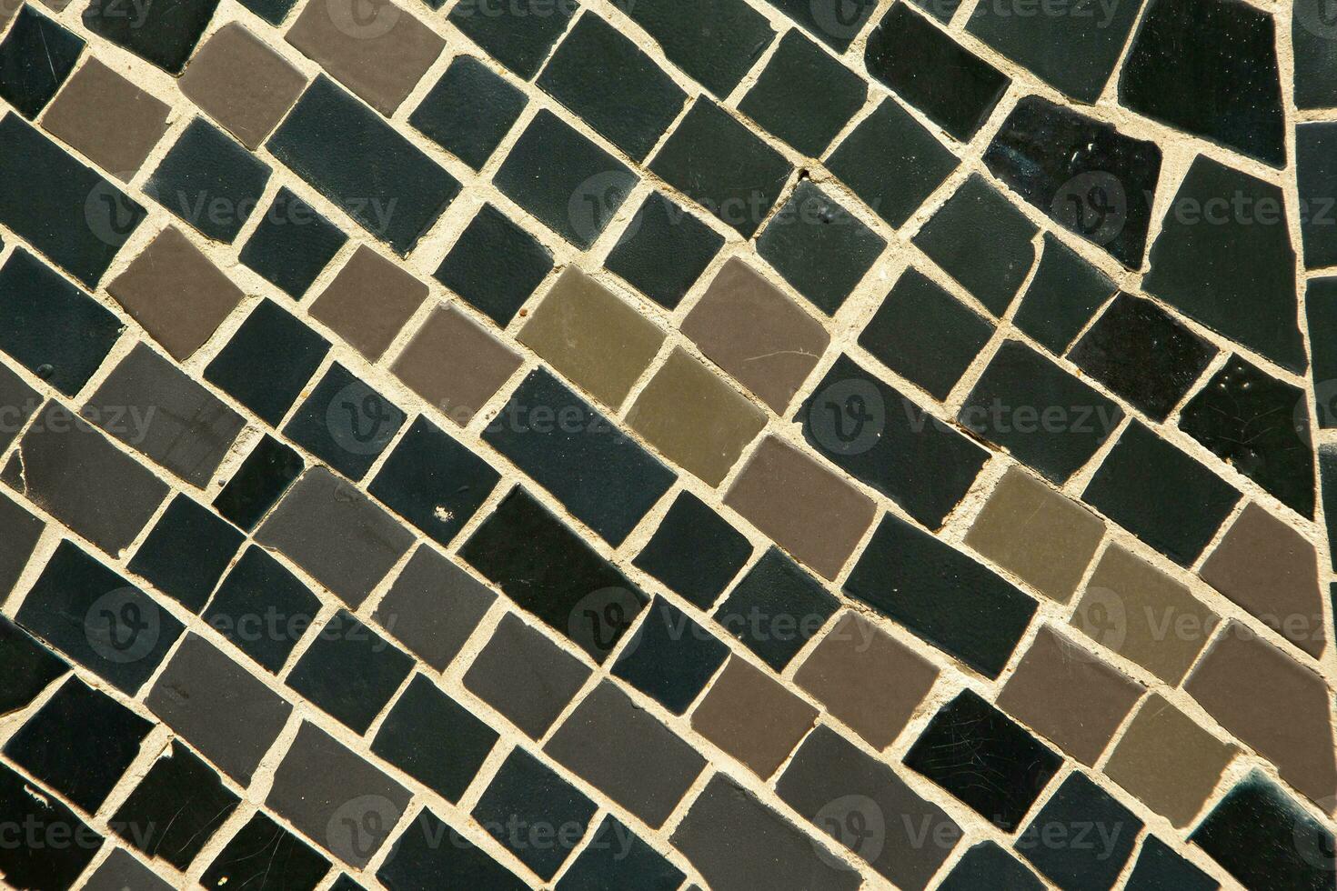 Colorful ceramic mosaic on the walls of the building. Abstract background and texture for design. photo
