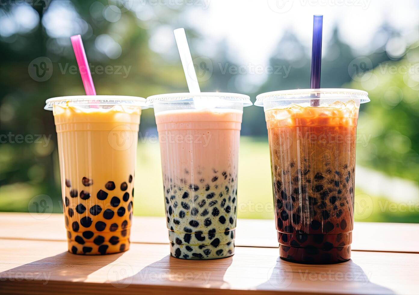 illustration of product photo of 3 plastic cups of boba milk tea, with bubbles, fun, blurry outdoor and nature background