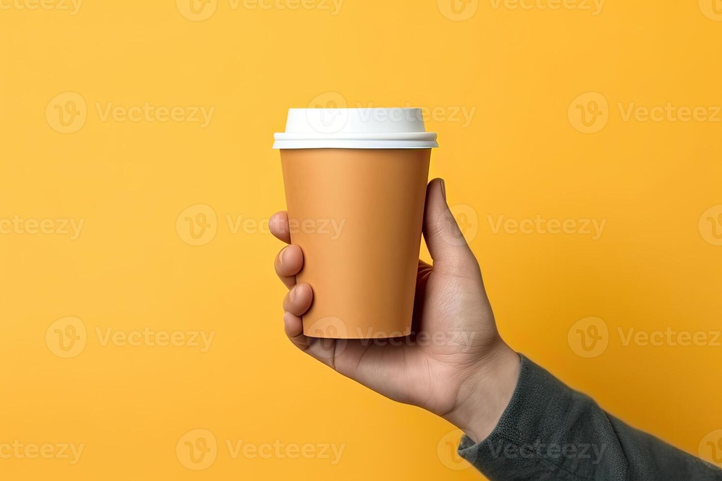 illustration of paper coffee cup in a hand, isolated yellow background photo