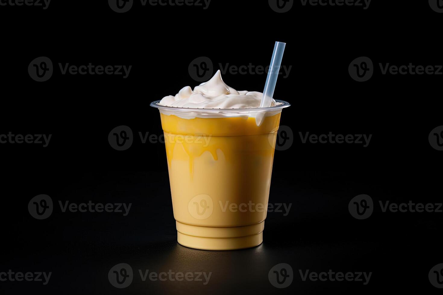 Mango smoothie milkshake in plastic takeaway cup isolated on dark background. photo