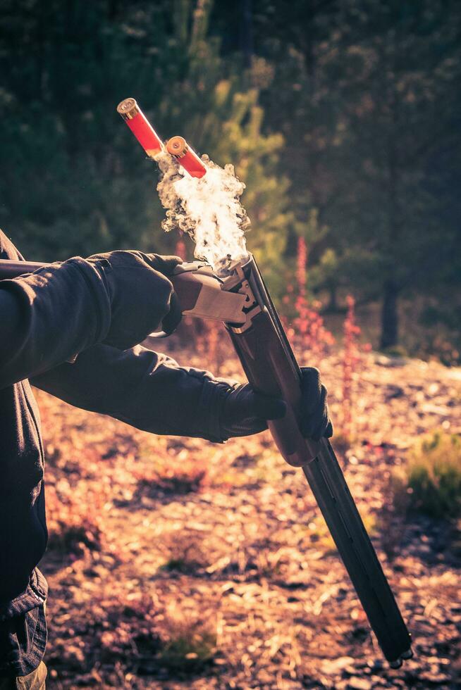 Smoky Shotgun Shells Ejection photo