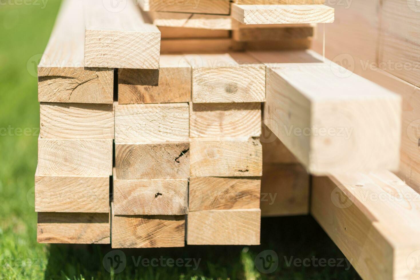 Pile of Evenly Cut Wooden Planks Closeup photo