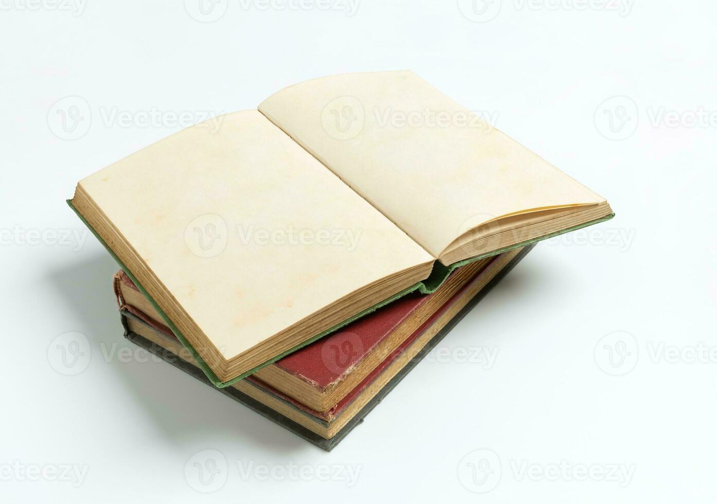 stack of open old book on white background for mockup blank template photo