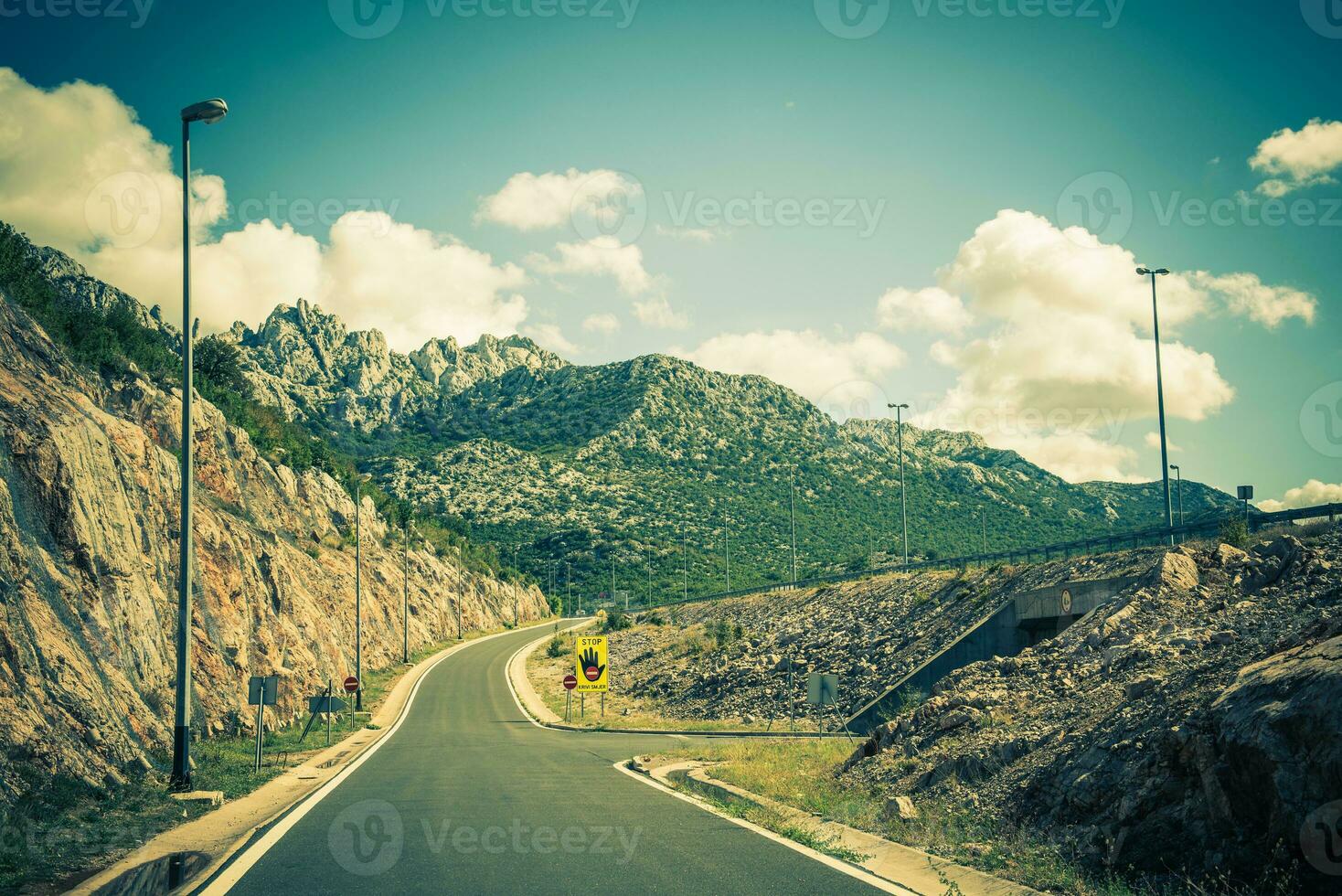 Road Among the Mountains in the Summer photo