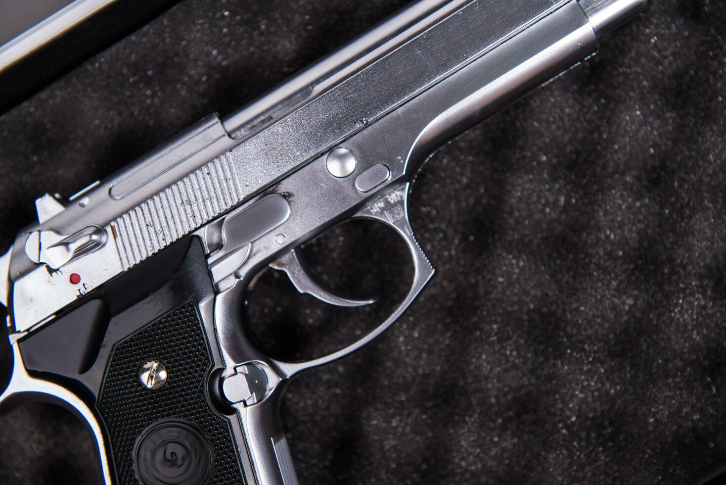 Handgun Closeup in suitcase photo