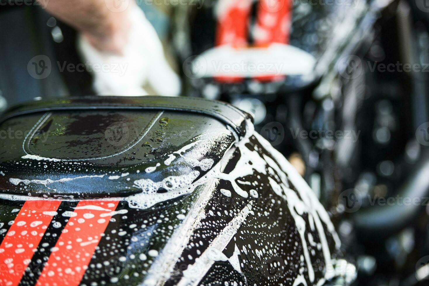 Cleaning Motorcycle Closeup photo